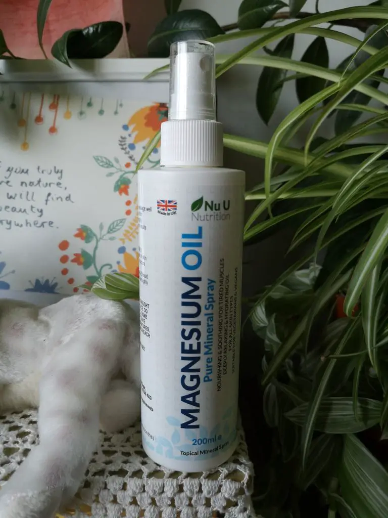 A bottle of Nu U Nutrition Magnesium Oil Pure Mineral Spray