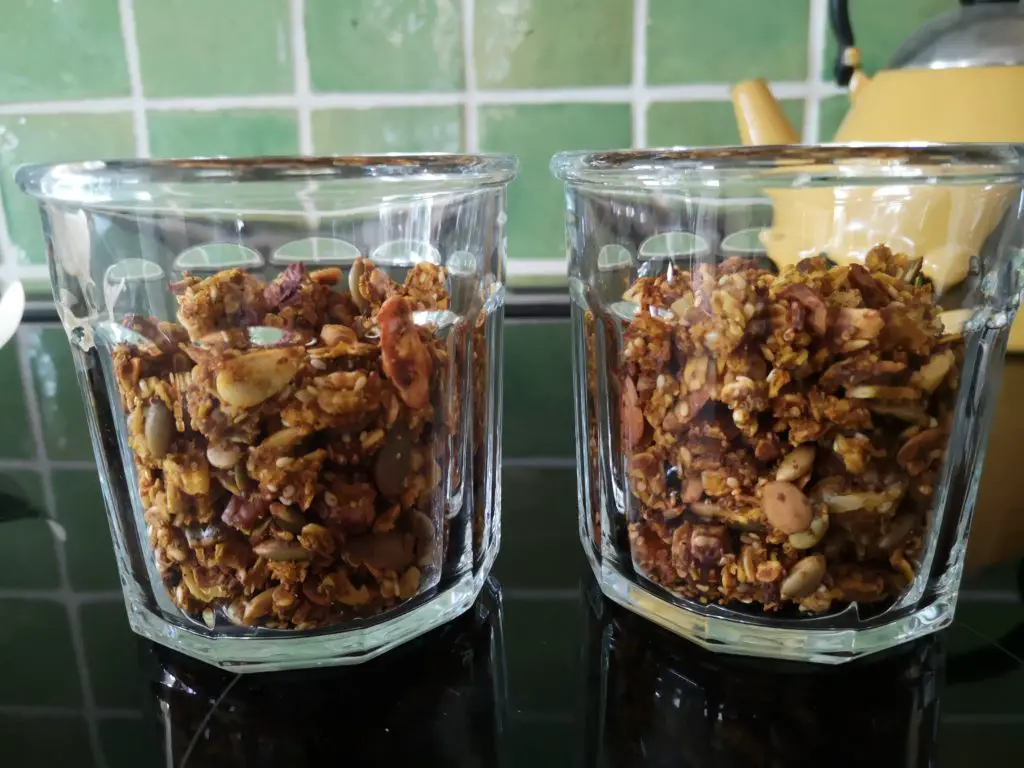 Pumpkin spice granola in two pyrex jars