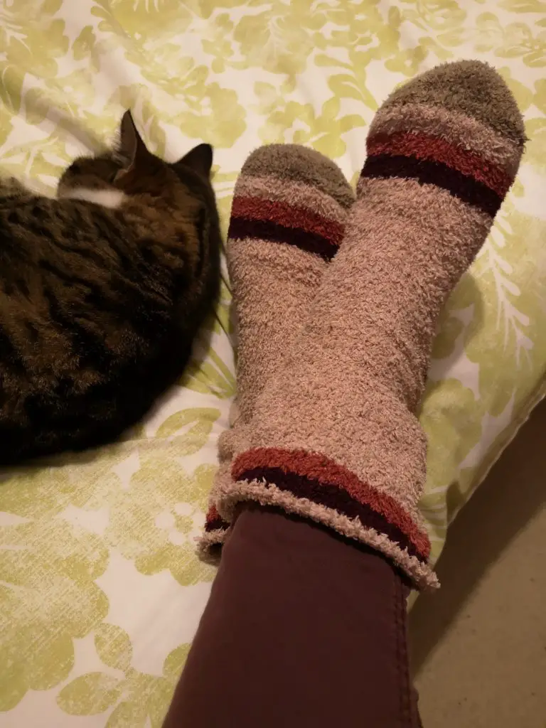 My feet in fluffy socks