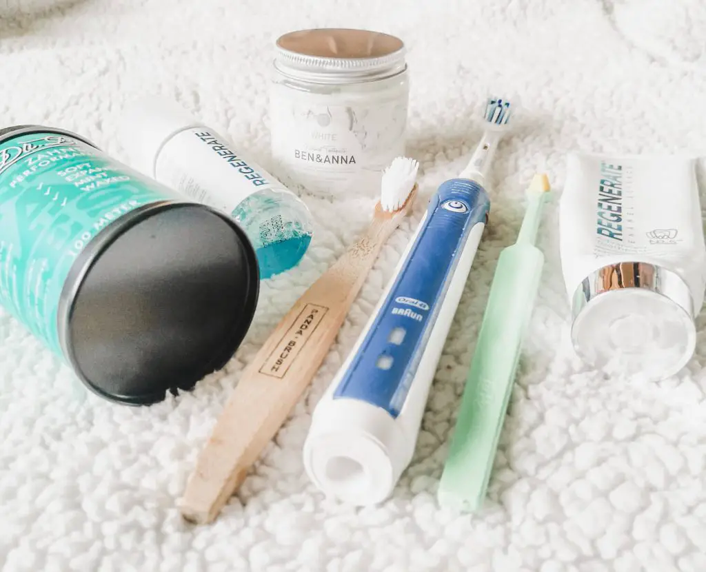 A selection of dental care products including toothbrushes, toothpaste, mouthwash and dental floss.