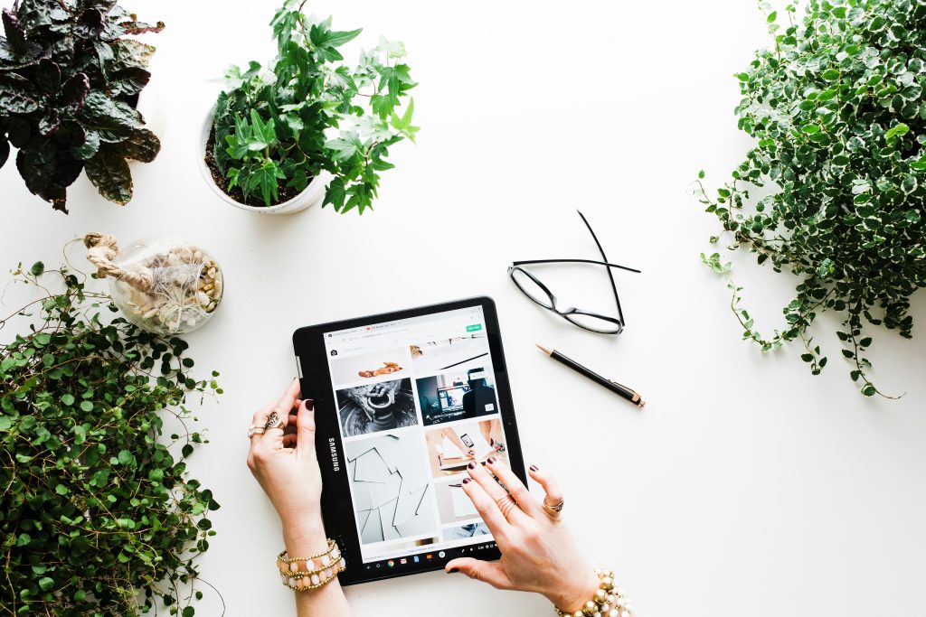  A person shopping online on a tablet.